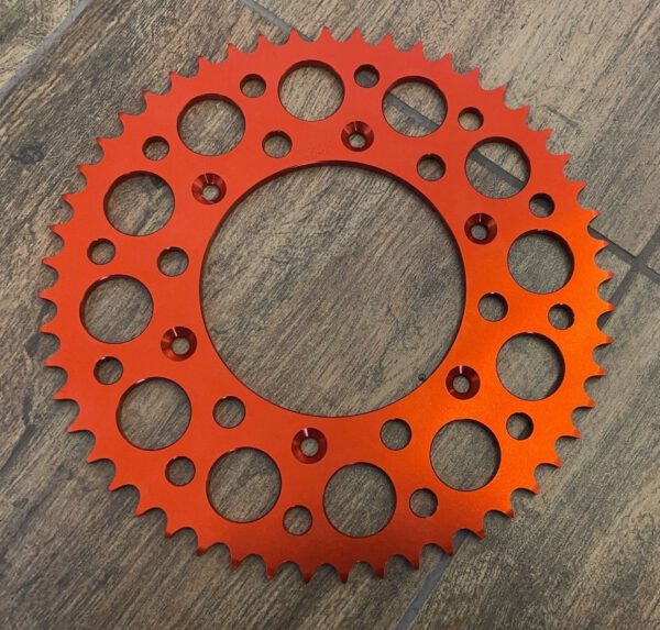 CORONA 51 DENTI PASSO 520 PER CROSS 125cc 2T IN ERGAL ARANCIONE RACING