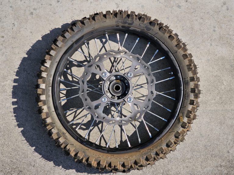 CERCHIO GOMMATO GOMMA CERCHIATA FERRO ANTERIORE 60/100-14 CON DISCO FRENO ATTACCO SDG PERNO RUOTA 15mm