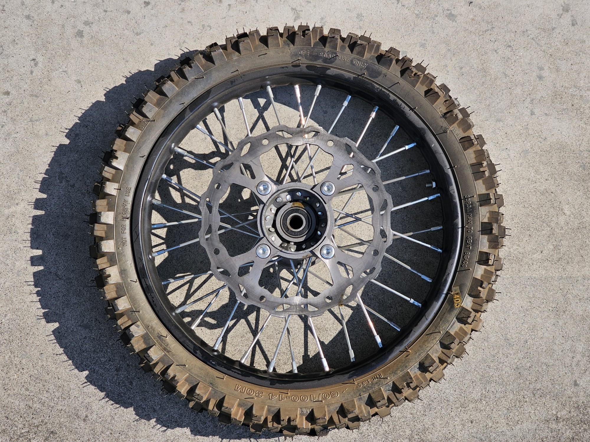 CERCHIO GOMMATO GOMMA CERCHIATA FERRO ANTERIORE 60/100-14 CON DISCO FRENO ATTACCO SDG PERNO RUOTA 15mm